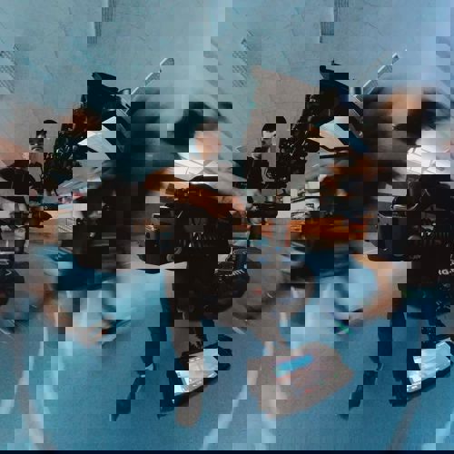 Cameraman shooting a cool commercial in a sportscenter on a steadicam